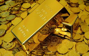 Gold bars and coins featured